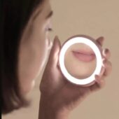 Portable beauty mirror designed for travel and daily use